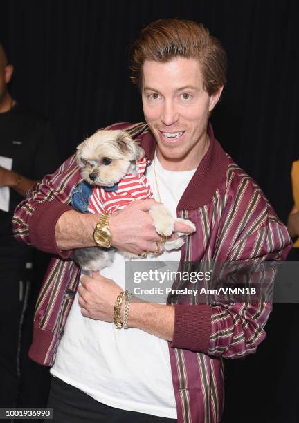 Snowboarder Shaun White and Leroy Brown aka Leroy The Good Boy attend the Nickelodeon Kids' Choice Sports 2018 at Barker Hangar on July 19, 2018 in...