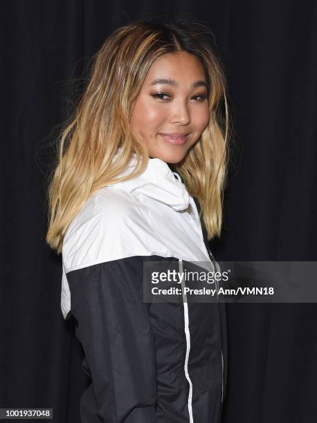 Snowboarder Chloe Kim poses in the Green Room at the Nickelodeon Kids' Choice Sports 2018 at Barker Hangar on July 19, 2018 in Santa Monica,...