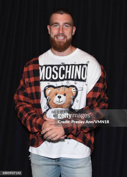 Player Travis Kelce poses in the Green Room at the Nickelodeon Kids' Choice Sports 2018 at Barker Hangar on July 19, 2018 in Santa Monica, California.