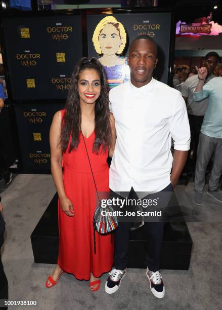 Mandip Gill and Tosin Cole pose with Jodie Whittaker Lego figure at BBC America's "Doctor Who" at Comic-Con International 2018 at San Diego...