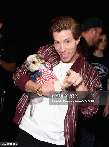 Snowboarder Shaun White and Leroy Brown aka Leroy The Good Boy attend the Nickelodeon Kids' Choice Sports 2018 at Barker Hangar on July 19, 2018 in...