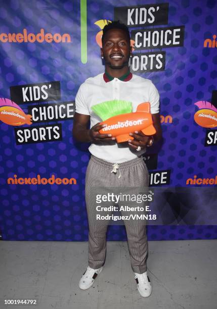 Player Antonio Brown poses backstage at the Nickelodeon Kids' Choice Sports 2018 at Barker Hangar on July 19, 2018 in Santa Monica, California.