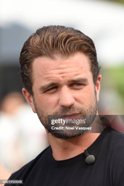 Milo Gibson visits 'Extra' at Universal Studios Hollywood on July 19, 2018 in Universal City, California.