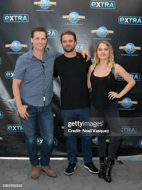 Peter Facinelli, Milo Gibson and Jordan Hinson visit 'Extra' at Universal Studios Hollywood on July 19, 2018 in Universal City, California.