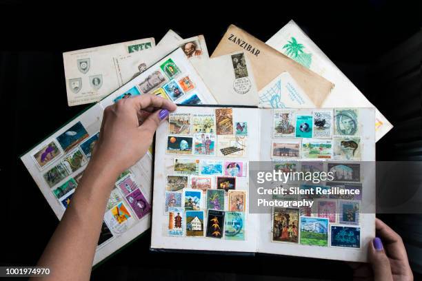 the stamp collector - stamp collection stock-fotos und bilder