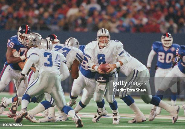 Troy Aikman, Quarterback for the Dallas Cowboys during the National Football Conference East game against the New York Giants on 18 October 1999 at...