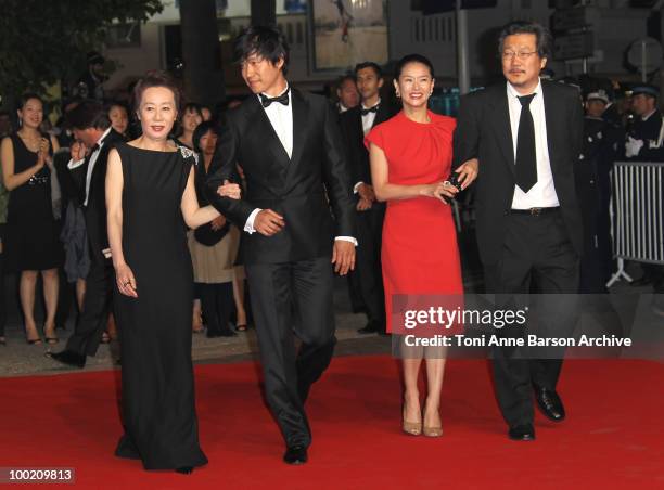 Yuh-Jung Youn, Joonsang Yu, Jiwon Ye and Sangsoo Hong attend the 'Uncle Boonmee Who Can Recall His Past Lives' Premiere at the Palais des Festivals...