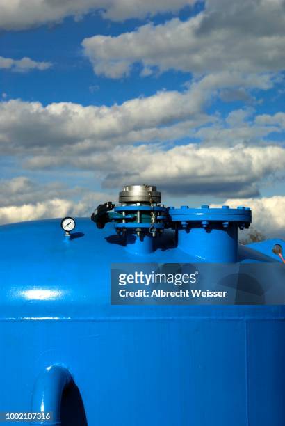 groundwater purification plant, blue container in front of a blue sky, baden-wuerttemberg, germany - groundwater stockfoto's en -beelden