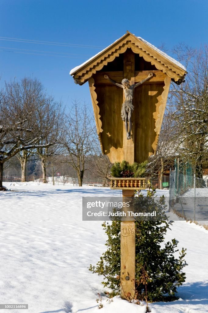 Wayside cross in winter, Agatharied, Bavaria, Germany