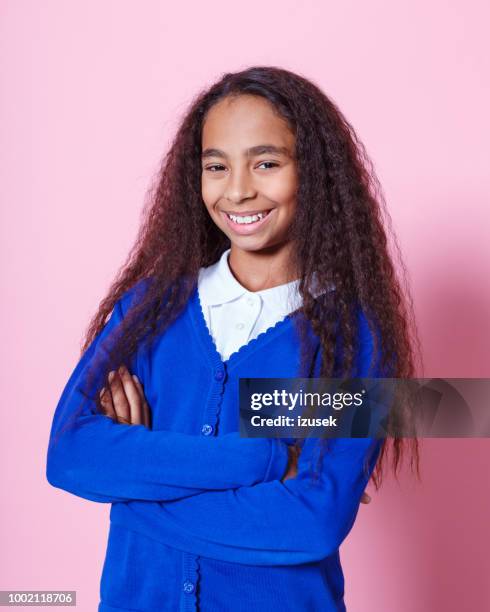 portrait of happy afro amercian schoolgirl - african american school uniform stock pictures, royalty-free photos & images