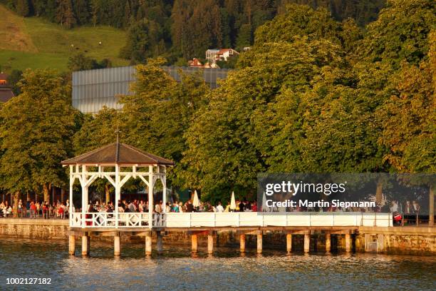 pavilion on a lakeside promenade in front of kunsthaus bregenz gallery, lake constance, vorarlberg, austria - bregenz stock pictures, royalty-free photos & images