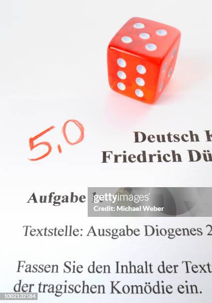 symbolic image for grading in subject german by using dice - portrait studio shot stock illustrations