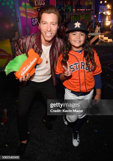 Snowboarder Shaun White poses backstage with a fan at the Nickelodeon Kids' Choice Sports 2018 at Barker Hangar on July 19, 2018 in Santa Monica,...