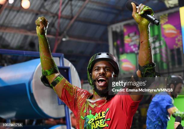 Host Chris Paul participates in a challenge during the Nickelodeon Kids' Choice Sports 2018 at Barker Hangar on July 19, 2018 in Santa Monica,...