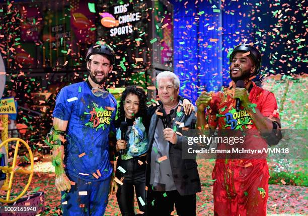 Host Chris Paul, Liza Koshy, Marc Summers and Michael Phelps participate in a challenge during the Nickelodeon Kids' Choice Sports 2018 at Barker...