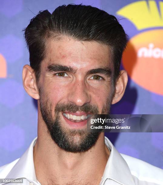 Michael Phelps, arrives at the Nickelodeon Kids' Choice Sports Awards 2018 at Barker Hangar on July 19, 2018 in Santa Monica, California.