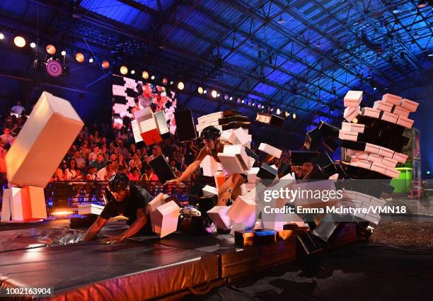Player P.K. Subban and skier Mikaela Shiffrin participate in a challenge during the Nickelodeon Kids' Choice Sports 2018 at Barker Hangar on July 19,...