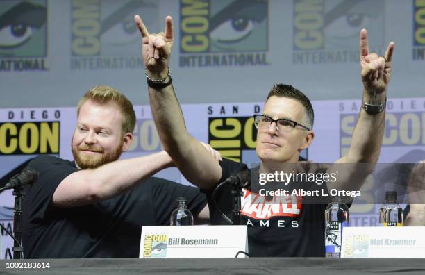 Mike Jones and Bill Rosemann speak onstage during the Marvel Games Panel during Comic-Con International 2018 at San Diego Convention Center on July...