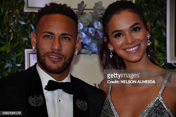 Brazilian PSG's footballer Neymar Junior and his girlfriend Bruna Marquezine, arrive to participate in the charity auction of the Neymar Jr....