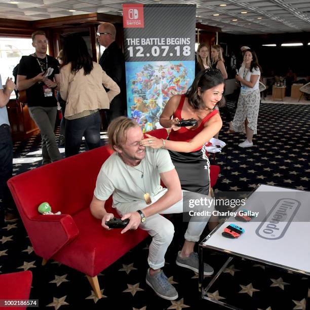 Tom Felton and Mika Watkins put their gaming skills to the test playing Mario Kart 8 Deluxe on Nintendo Switch at the Variety Studio at Comic-Con...