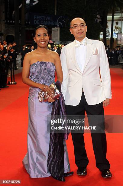Thai actress Wallapa Mongkolprasert and Thai director Apichatpong Weerasethakul arrive for the screening "Lung Boonmee Raluek Chat" presented in...