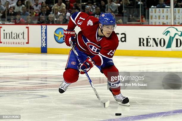 Mike Cammalleri of the Montreal Canadiens handles the puck in Game 3 of the Eastern Conference Finals during the 2010 NHL Stanley Cup Playoffs at...