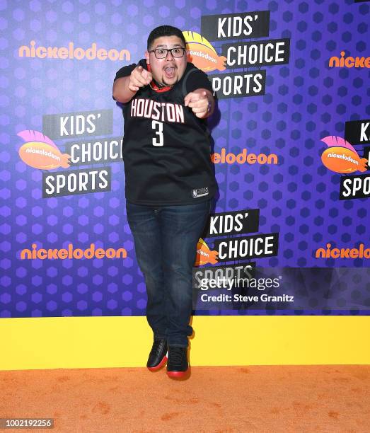 Rico Rodriguez arrives at the Nickelodeon Kids' Choice Sports Awards 2018 at Barker Hangar on July 19, 2018 in Santa Monica, California.