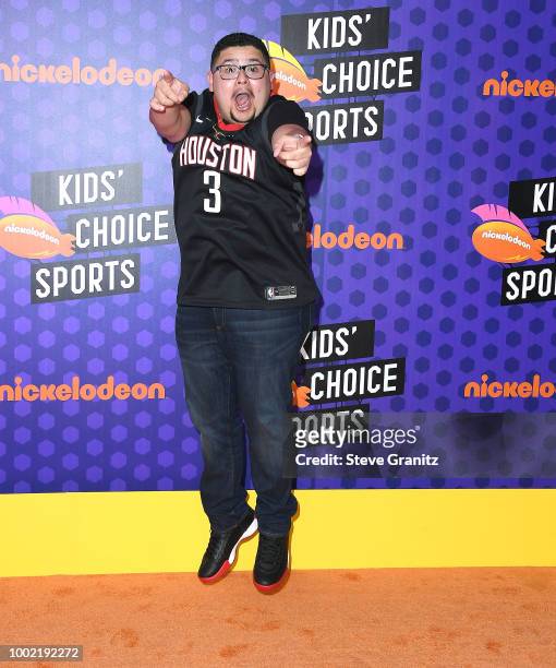 Rico Rodriguez arrives at the Nickelodeon Kids' Choice Sports Awards 2018 at Barker Hangar on July 19, 2018 in Santa Monica, California.