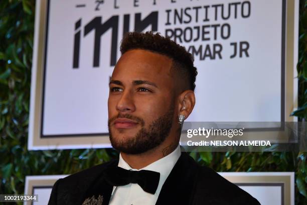 Brazilian PSG's footballer Neymar Junior, arrives to participate in the charity auction of the Neymar Jr. Institute in Sao Paulo, Brazil on July 19,...