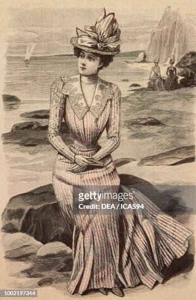 Woman wearing a long sleeved beach dress and hat, creation by Madame Vincenot, engraving from La Mode Illustree, No 23, June 10, 1900.