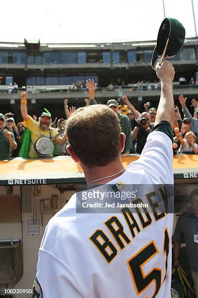 Dallas Braden of the Oakland Athletics celebrates after pitching a perfect game against the Tampa Bay Rays during an MLB game at the Oakland-Alameda...