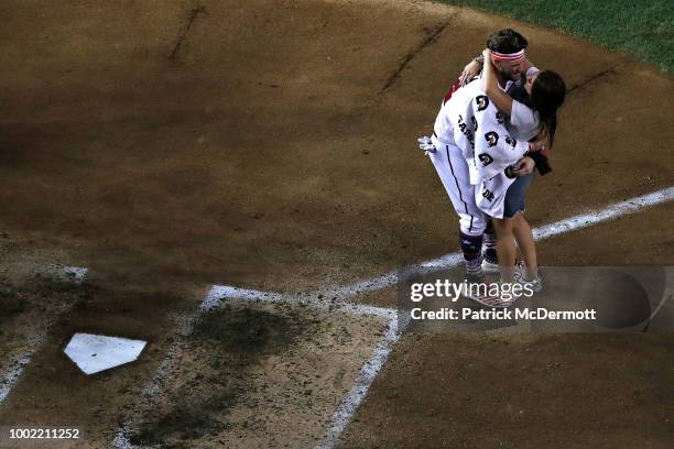 Bryce Harper celebrates with his wife Kayla Varner during the T-Mobile Home Run Derby at Nationals Park on July 16, 2018 in Washington, DC.