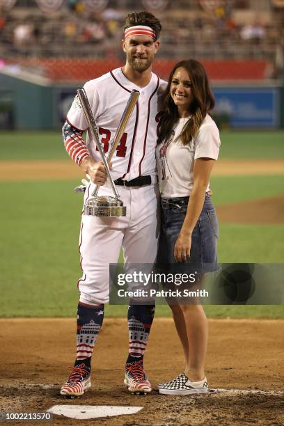 Bryce Harper celebrates with his wife Kayla Varner during the T-Mobile Home Run Derby at Nationals Park on July 16, 2018 in Washington, DC.