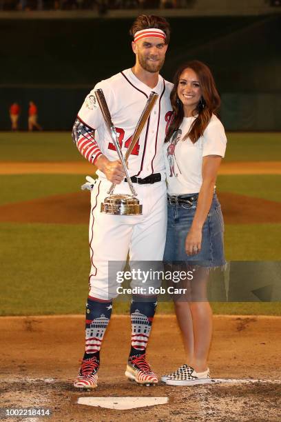 Bryce Harper celebrates with his wife Kayla Varner during the T-Mobile Home Run Derby at Nationals Park on July 16, 2018 in Washington, DC.