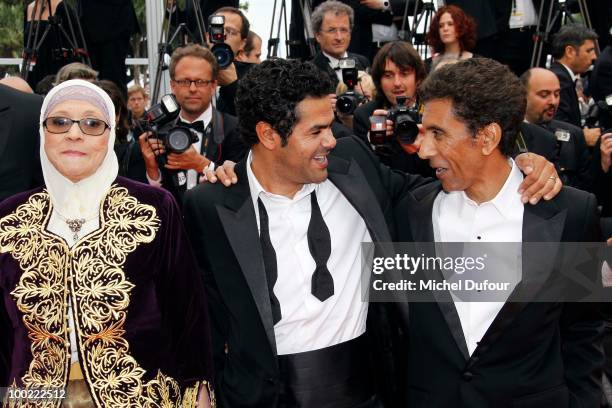 Chafia Boudraa, Jamel Debbouze and Rachid Bouchareb attend the premiere of 'Outside Of The Law' at the Palais des Festivals during the 63rd Annual...