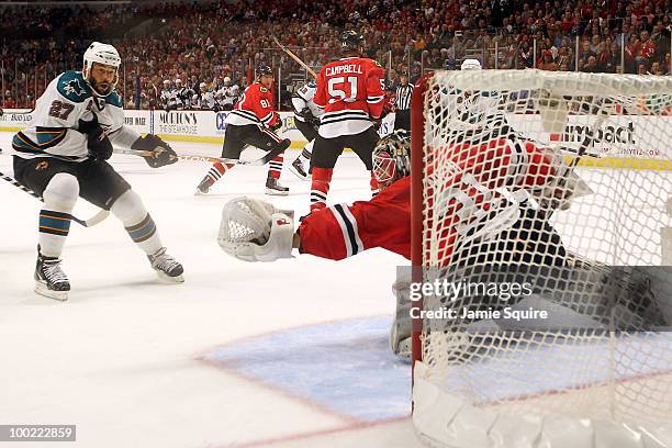 Manny Malhotra of the San Jose Sharks reacts as goaltender Antti Niemi of the Chicago Blackhawks makes a save in the first period of Game Three of...