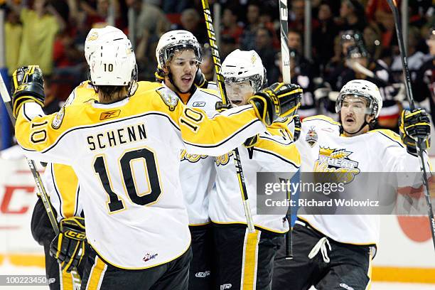 Members of the Brandon Wheat Kings celebrate the third period goal by Matt Calvert during the game against the Calgary Hitmen at the 2010 Mastercard...