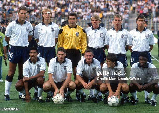 July 1990 - Turin - FIFA World Cup semi-final - West Germany v England - the English team pose for a group photo: back row Terry Butcher, Mark...