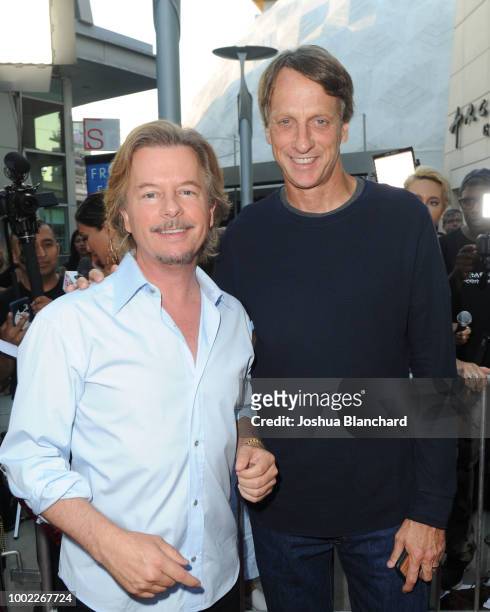 Tony Hawk and David Spade arrive at "Father Of The Year" LA Special Screening at ArcLight Hollywood on July 19, 2018 in Hollywood, California.