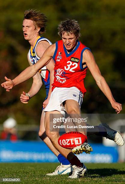 Clay Smith of the Power kicks the ball during the round seven TAC Cup match between the Eastern Ranges and the Gippsland Power at Box Hill City Oval...