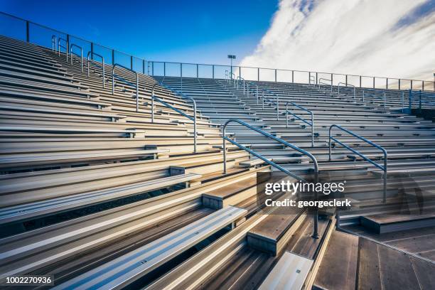 empty stadium bench seating - bleachers stock pictures, royalty-free photos & images