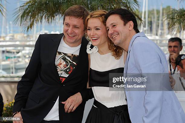 Actor Artem Menshikov, actress Nadezhda Mihalkova and actor Oleg Menshikov attend the "The Exodus - Burnt By The Sun" photocall at the Palais des...