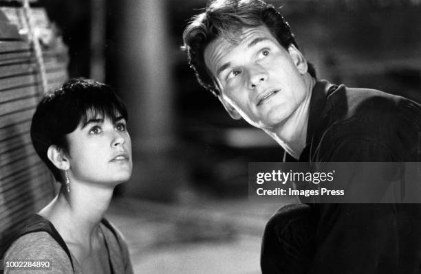 Patrick Swayze and Demi Moore star as Sam Wheat and Molly Jensen in the suspense thriller "Ghost", directed by Jerry Zucker.