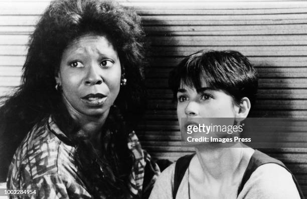 The ghost of Sam Wheat is able to communicate with Molly Jensen through psychic Oda Mae Brown in the suspense thriller "Ghost", directed by Jerry...