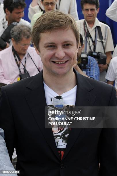 Russian actor Artem Menshikov poses during the photocall of "Utomlyonnye Solntsem 2: Predstoyanie" presented in competition at the 63rd Cannes Film...