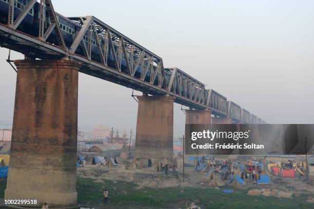 Kumbh Mela camp in Allahabad for pilgrims and sadhus. The Kumbh Mela is a mass Hindu pilgrimage of faith in which Hindus gather to bathe in a sacred...