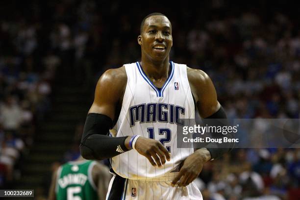Dwight Howard of the Orlando Magic smiles as he looks on against the Boston Celtics in Game Two of the Eastern Conference Finals during the 2010 NBA...