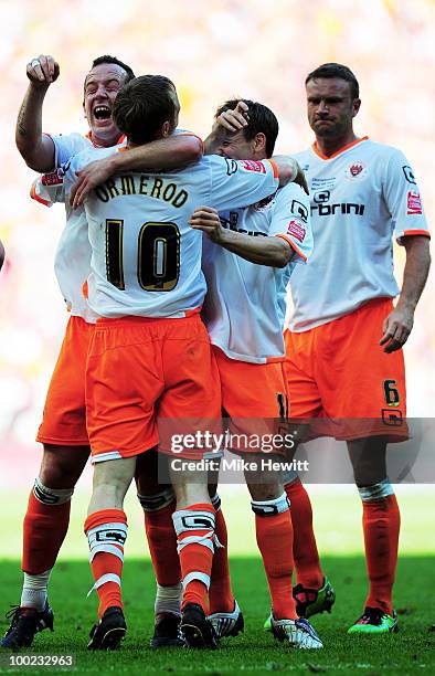 Brett Ormerod, Charlie Adams and David Vaughan of Blackpool celebrate their team's third goal during the Coca Cola Championship Playoff Final between...