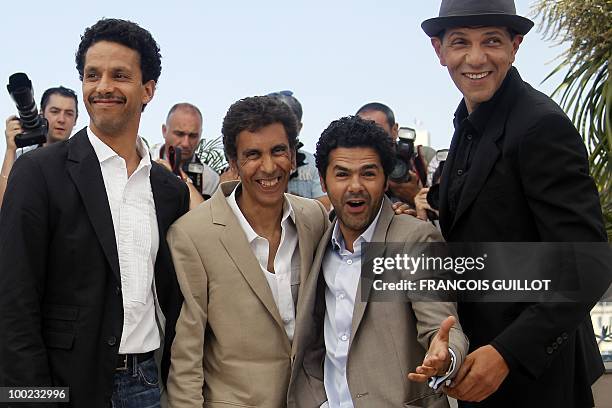 French actor Sami Bouajila, French director Rachid Bouchareb, French actor Jamel Debbouze and French actor Roschdy Zem pose during the photocall of...