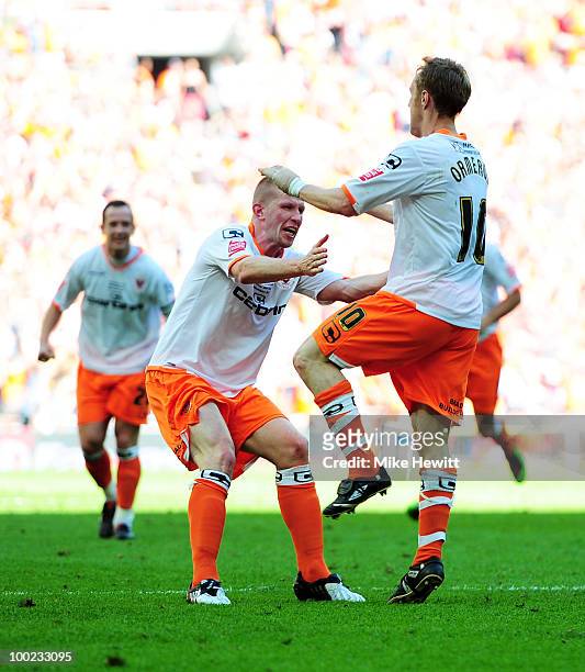 Brett Ormerod and Keith Southern of Blackpool celebrate their team's third goal during the Coca Cola Championship Playoff Final between Blackpool and...
